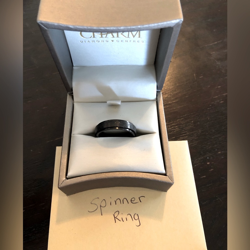 Stainless steel wedding ring spinner